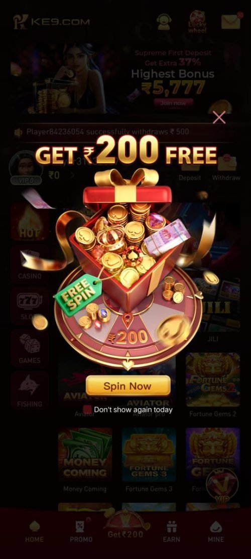 KE9 app popup offering ₹200 free reward with a spin wheel and gift box.